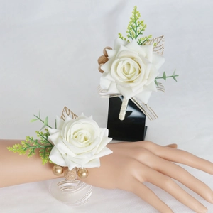 Wedding boutonniere and wrist corsage set with white roses and golden accents
