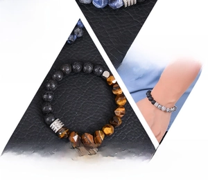 Detail of 10mm volcanic lava and tiger eye stone beads with polished metal spacers
