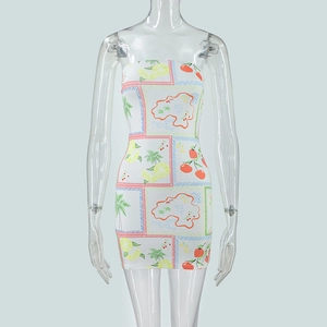 Detail of slim fit strapless mini dress featuring vibrant fruit and palm tree prints
