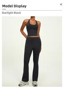 Starry Black high-waist yoga set with halter top and flared pants on a female model