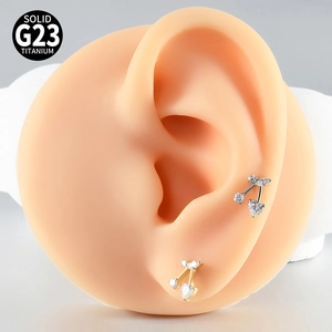 Orecchini a ciliegia in titanio G23 con zirconi a cuore e tondi in finitura oro e argento