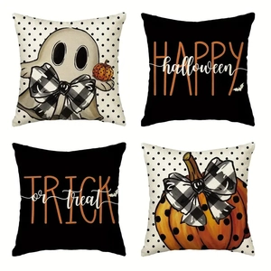 Set of 4 linen Halloween pillow covers with ghost, pumpkin, and bat patterns on white background