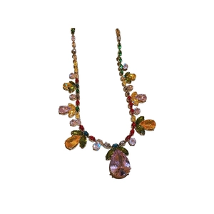 Golden flower and leaf necklace set with multi-colored teardrop zircon gemstones