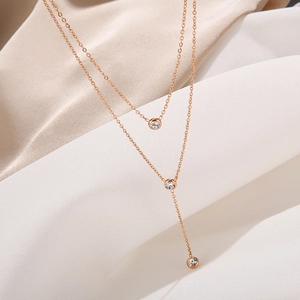Double-layer rose gold stainless steel necklace with three sparkling round zircons