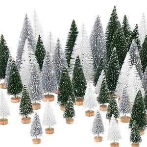 Detail of mini Christmas trees with wooden bases in green, white, and silver tones
