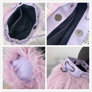 Macro view of purple faux fur bucket bag details with drawstring and magnetic closure
