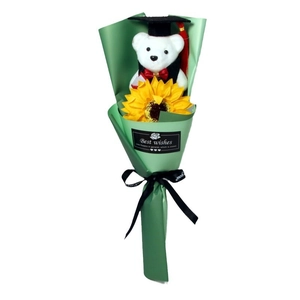 Graduation plush bear with sunflower soap flower bouquet in green wrapping paper