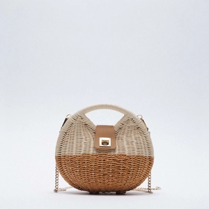 Two-tone woven rattan shell bag with top handle and gold chain strap for summer
