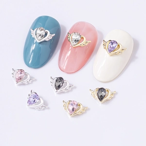 Angel wing heart crystal nail charms in gold and silver finish for creative manicure