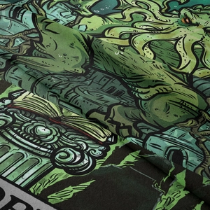 Macro detail of Bohemian tapestry texture showing Cthulhu mythos illustration with eye and tentacles