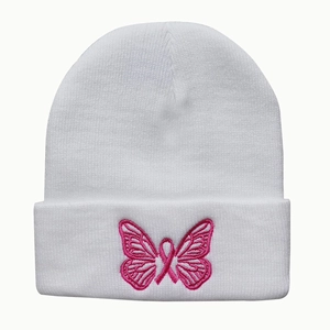White knitted beanie with pink butterfly embroidery and breast cancer awareness ribbon
