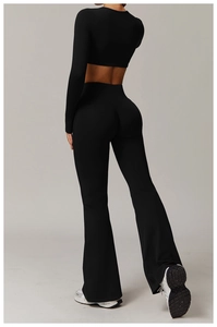 Detail of high-waisted flared yoga pants with scrunch butt lifting effect and slim fit