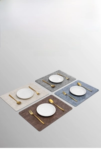 Detail of four-color PU leather placemats with waterproof texture and heat resistance