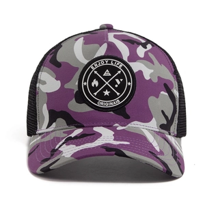 Purple camo trucker hat with mesh back and circular embroidered patch for outdoor sun protection