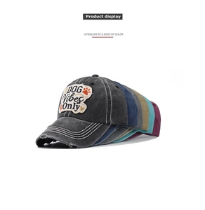 Detail of washed cotton baseball caps with DOG Vibes Only embroidery and distressed brims