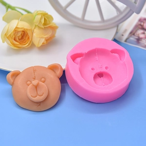 Cartoon bear-shaped silicone mold for DIY baking with 3D pink texture and brown sample
