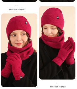 Three-piece winter set with rose red knit hat, scarf and gloves in soft thick fabric