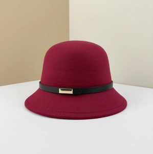 Elegant wine red wool bucket hat featuring a black leather belt with golden buckle