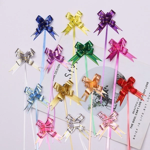 Close-up of assorted colorful 15# small PP plastic pull bows with golden edges