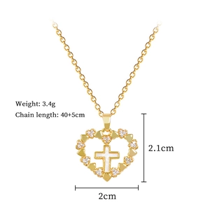 Detailed dimensions of gold heart and cross necklace with sparkling crystal inlay
