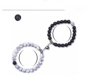 Détails des bracelets de couple cœur magnétique en pierre de lave et howlite de 8mm avec taille