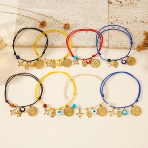 Handmade woven cross and evil eye charm bracelet set in assorted colors with hamsa hand