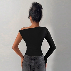 Back view of slim fit black one-shoulder long sleeve top with knot detail on the shoulder
