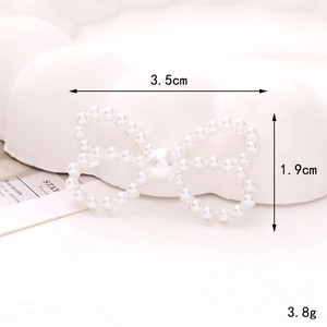 Accessoire nœud perle blanche dimensions 3,5cm x 1,9cm et poids 3,8g pour bijoux DIY