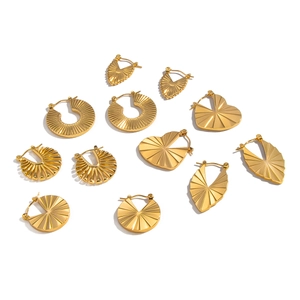 Collection of geometric gold plated earrings with textured radial patterns in various shapes