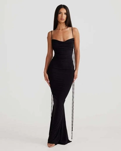 Close-up of black ruched backless maxi dress with side ties and fishtail hemline