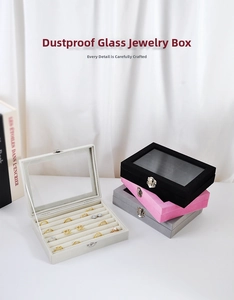 Macro detail of velvet jewelry box with glass lid for rings and earrings storage