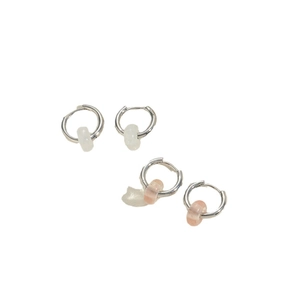 Minimalist silver huggie hoop earrings with white and pink round pendant beads
