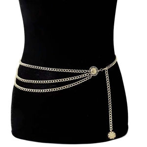 Detailed macro view of multi-layered gold waist chain with hollow sunflower motif