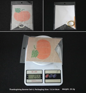 Detail view of Thanksgiving pumpkin banner showing 13.5x18cm dimensions and weight on scale