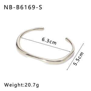 Irregular silver stainless steel cuff bracelet showing 6.3cm width and 20.7g weight