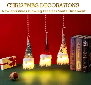 Close-up of glowing Christmas gnomes with warm LED light and shiny sequins details
