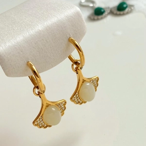 Creative fan-shaped earrings with round circles, white cat-eye stone, and zircon inlay