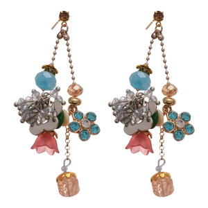 Vintage floral tassel earrings with blue crystals and pink resin flowers on white background