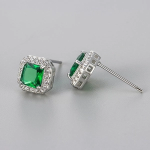Elegant silver square stud earrings with green zircon centers and diamond halo