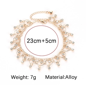Detail showing 23cm gold alloy anklet with rhinestone tassels and specifications