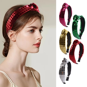 Detail view of sparkly sequin headbands for women in red, pink, green, gold and silver