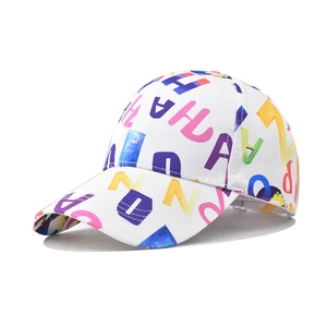 Macro detail of graffiti letters print and vibrant colors on white cotton baseball cap