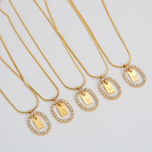 Gold plated stainless steel snake chain necklaces with crystal oval letter pendants