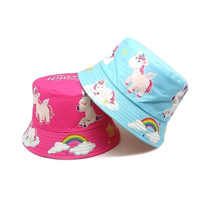 Kids unicorn sun hats in pink and blue colors with rainbow prints and cute patterns
