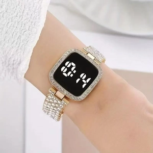 Gold digital watch for women with rhinestone-encrusted bezel and band, LED display
