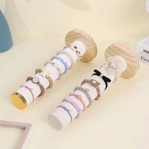 Wooden velvet scrunchie display stand with morandi macaron hair ties and accessories