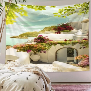 Detail view of large wall tapestry featuring Mediterranean landscape and pink floral archway