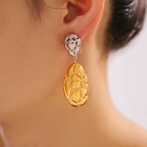 Irregular two-tone oval hollow drop earrings in gold and silver finish for women