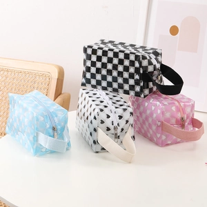 Group of waterproof checkered pencil cases with heart patterns in four vibrant colors