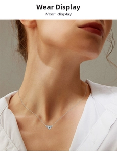 Exquisite heart-shaped moissanite necklace pendant shown on a model neck with a white shirt